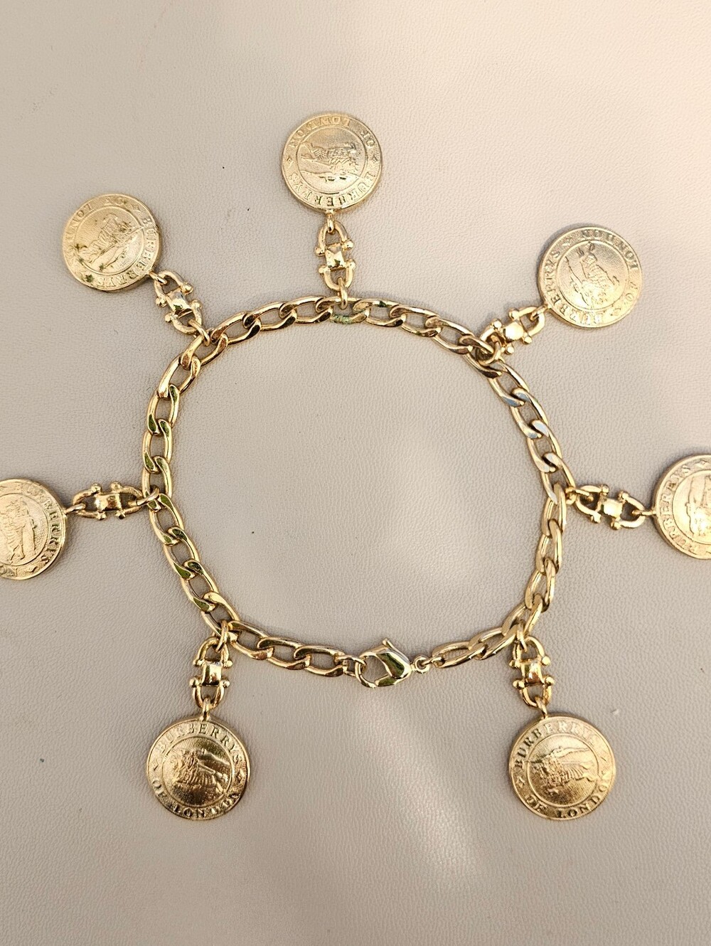 BURBERRYS Gold Coin Trinket Bracelet